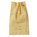 Yellow fabric with red and black lines on a beige background, ikat collection ATELIER A.PUUR.A 