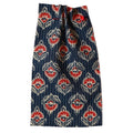 Printed fabric with a blue, red, and white pattern on a beige background. Fabric collection ATELIER A.PUUR.A 