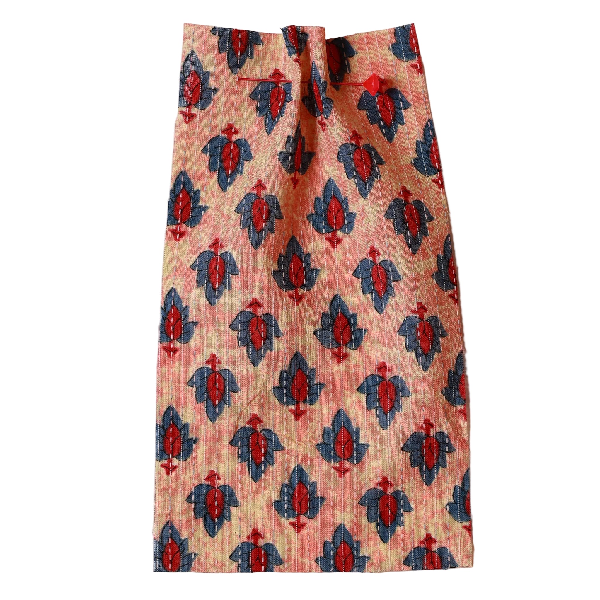 Printed Fabric with orange, red and blue pattern on a beige background. Fabric collection ATELIER A.PUUR.A 